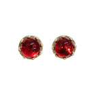 A product photo of a bold, ornate pair of fiery garnet earrings set in solid 9ct yellow gold. The cabochon shaped red garnet gemstones sit in elaborately detailed yellow gold earring settings, almost designed to look like an antique crown.