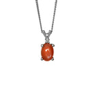 A product photo of an orange moonstone pendant set in solid sterling 925 silver suspended by a silver chain over a white background. The orange, pearlescent moonstone shimmers, and is topped a single white moissanite.