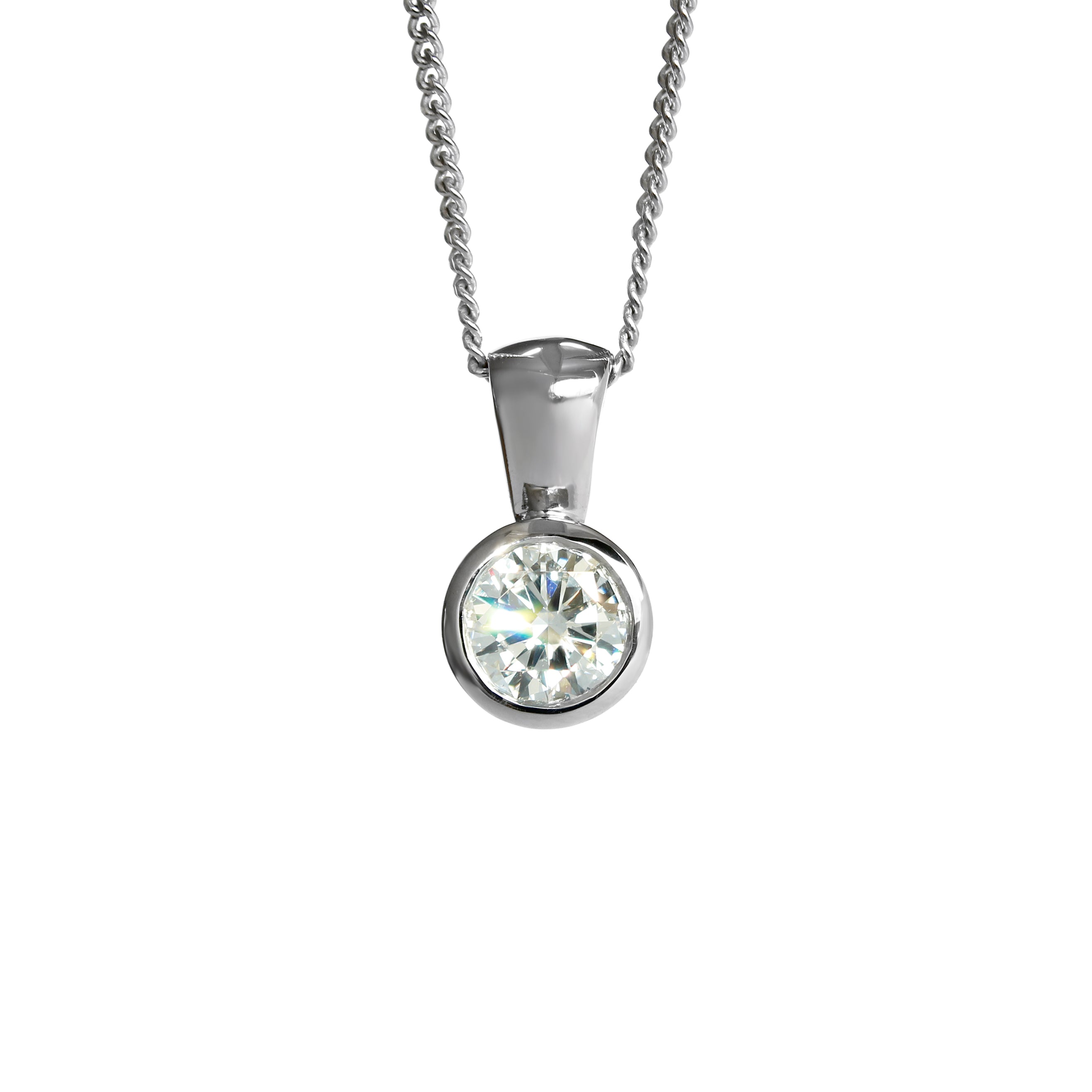 A product photo of a bezel-set lab diamond pendant suspended by a gold chain over a white background. The stone is a stunningly-bright 0.50ct round brilliant-cut jewel, and is perfectly secured within the minimalistic and elegant tube setting in solid 14 karat white gold. The pendant would make an excellent birthday gift for a wearer born in April, given the diamond birthstone in its centre.