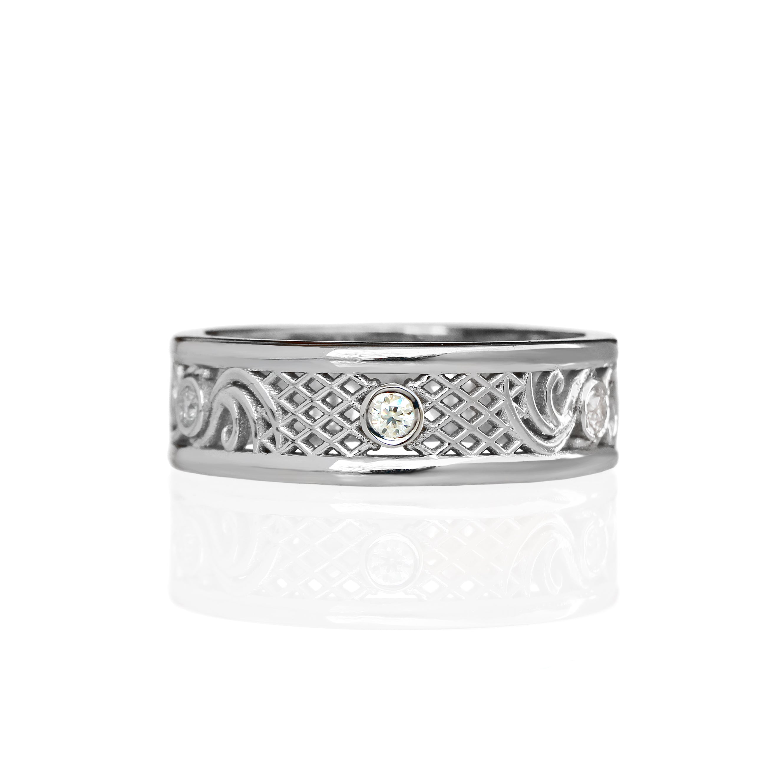 A product photo of a filigree detailed unisex wedding band in solid 925 sterling silver on a white background. The filigree patterning consists of netted silver details, that switches into swirling floral patterning around 3 of the 6 total 0.03ct dazzling white moissanite gemstones worked into the filigree detailing, each held in place by a bezel setting. 