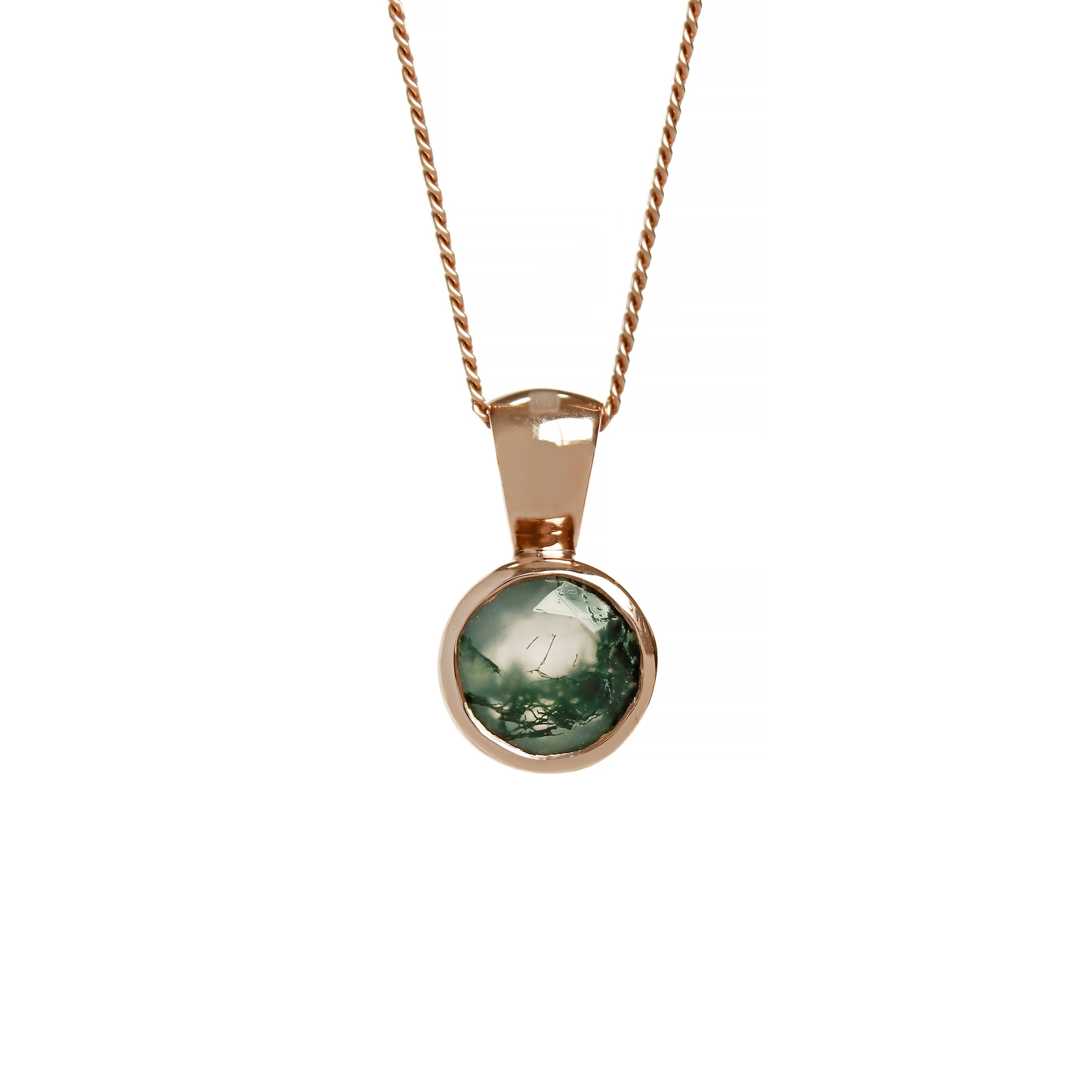 A product photo of a round moss agate pendant in a rose gold bezel setting hanging by a chain over a white background.