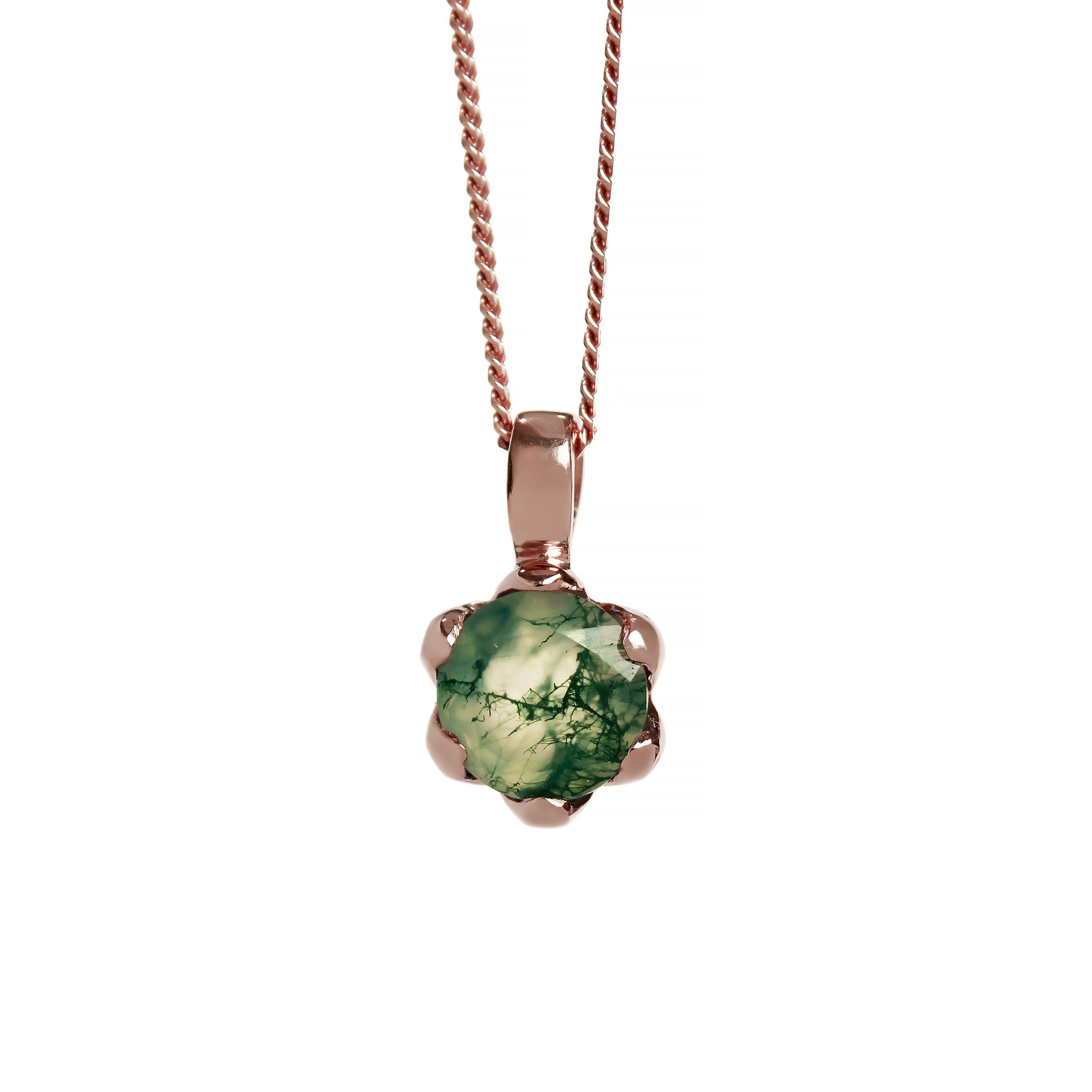 A product photo of a 7mm round moss agate pendant in 9k rose gold suspended by a gold chain against a white background. The stone is held in place by 6 delicate golden claws. The 7mm round moss agate stone has light semi-opaque base colouring and swirling, dendritic tendrils of deep green and black inclusions