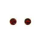 A product photo of 5.5mm Round Garnet Earring Studs in 9k Yellow Gold sitting on a plain white background. The stones are held in place by 4 delicate golden claws. The garnets reflect sanguine hues across their multi-faceted edges.