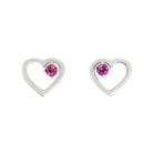 A product photo of two silver heart-shaped stud earrings sitting on a white background. A delicate, 2.5mm round warm purple rhodalite stone is nestled in the top right corner of each heart-shaped frame.