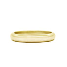 A product photo of a mens' ring made of 9k yellow gold. The band is softly rounded in a D shape.