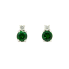 A product photo of a pair of white gold tsavorite earrings sitting against a white background. The simple circle-cut stones are complimented by a single white diamond atop each stone, encased in white gold. The green gemstone colours make these earrings a good alternative or substitute for emerald.