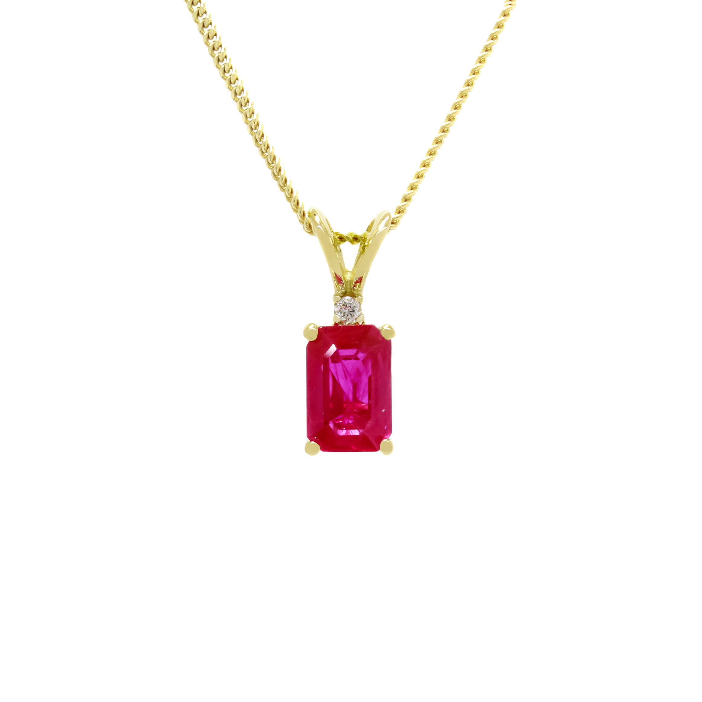 A product photo of a 0.66ct rectangular ruby and diamond pendant in 9k yellow gold suspended against a white background. The rectangular, emerald-cut ruby is a stunningly bright magenta colour, with deep natural inclusions making the stone appear as though deep red ink is swirling within. A single white diamond sits atop it, before meeting the split golden bail.