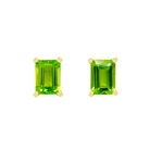 A product photo of a pair of 9ct yellow gold peridot earrings sitting on a white background. The emerald-cut 7x5mm peridot stones are held in place by 4 golden claws, and reflect chartreuse colours from their edges.