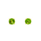 A product photo of two 9ct yellow gold stud earrings sitting on a white background. Held in place by 4 golden claws each are two dazzling 6mm round-cut green peridot stones, reflecting leafy and chartreuse hues from their many edges.