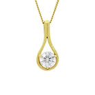 A product photo of a round moissanite pendant held in place by a frame of yellow gold in the shape of a teardrop, suspended against a white background.