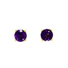 A product photo of two 9 karat yellow gold stud earrings sitting on a white background. Held in place by 4 golden claws each are two dazzling 6mm round-cut amethyst stones, reflecting violet light from their many edges.