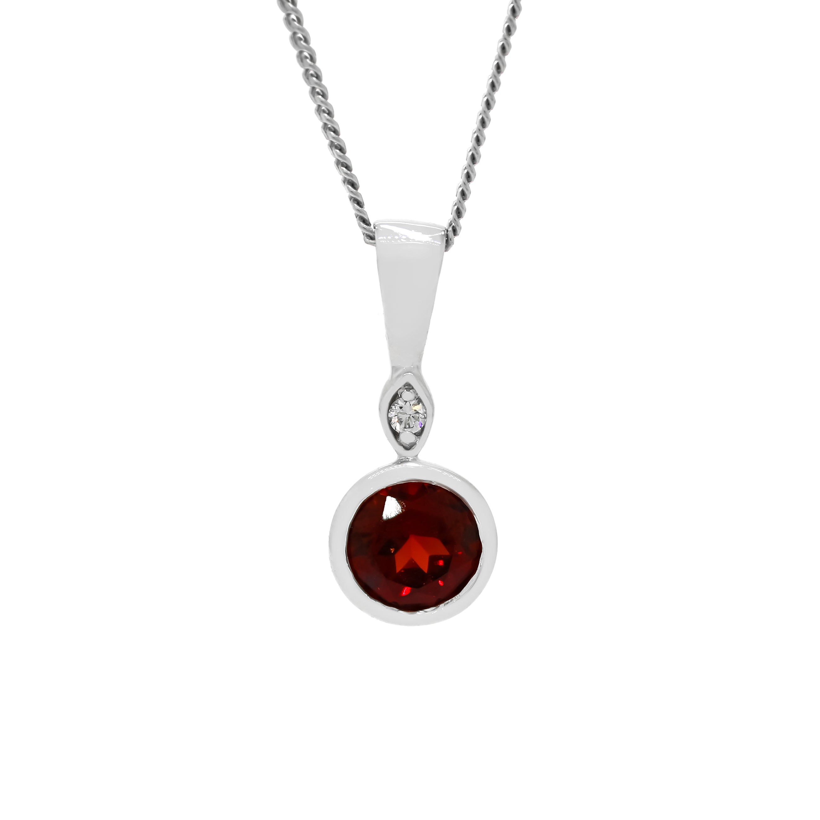 A product photo of a large, 6mm round garnet and diamond pendant suspended by a 9ct white gold chain over a plain white background. The 0.95ct garnet stone is a deep, dark red, and is set in a thick golden bezel setting.