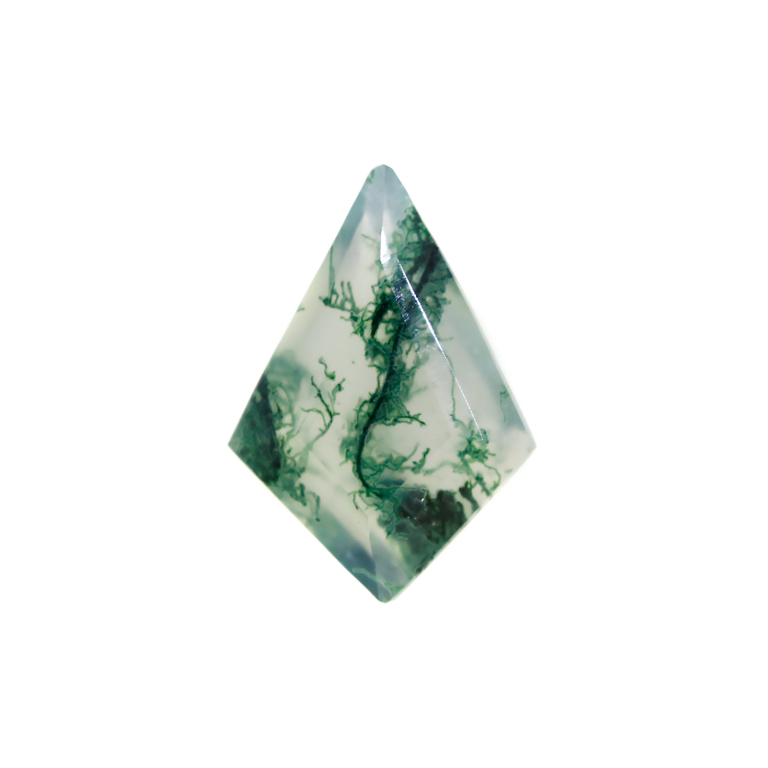 A product image of a loose 14x10mm faceted moss agate stone in the classic kite-shaped gemstone cut. The stone has a cool white milky colour, with deep, swirling green natural inclusions - appearing as moss-like structures or delicate inkspills within the stone. The faceted edges reflect bright white light.